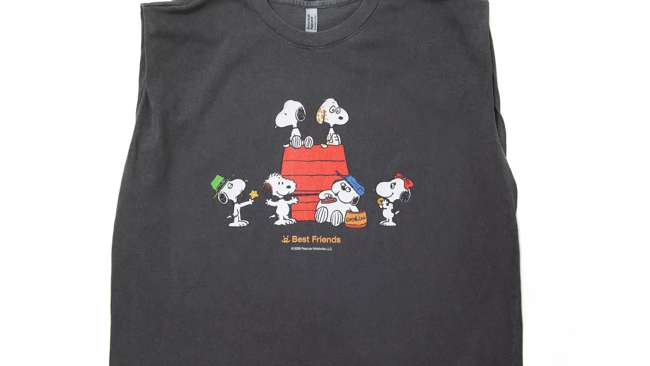 Dark gray sleeveless tee with Snoopy and friends around a red doghouse.